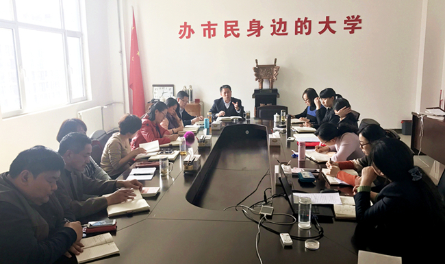 我校召~1_副本.jpg